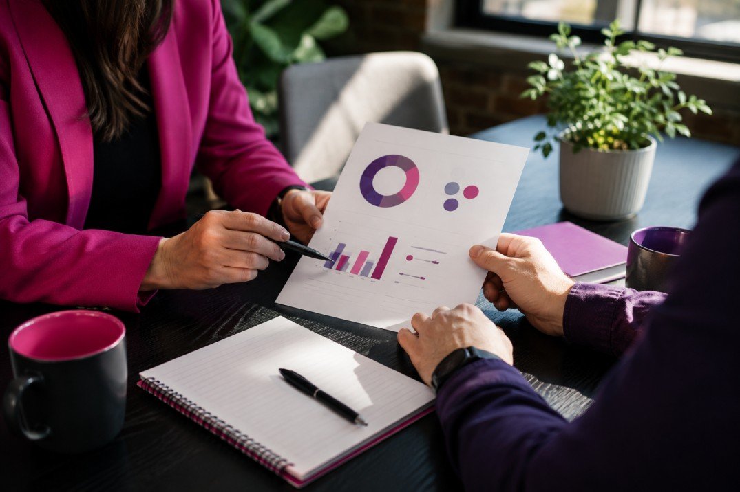 Business owner reviewing Google Ads performance with a PPC management team